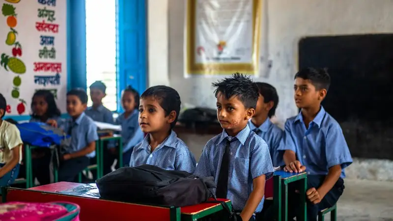 Schoolchildren in uniform in their classroom
